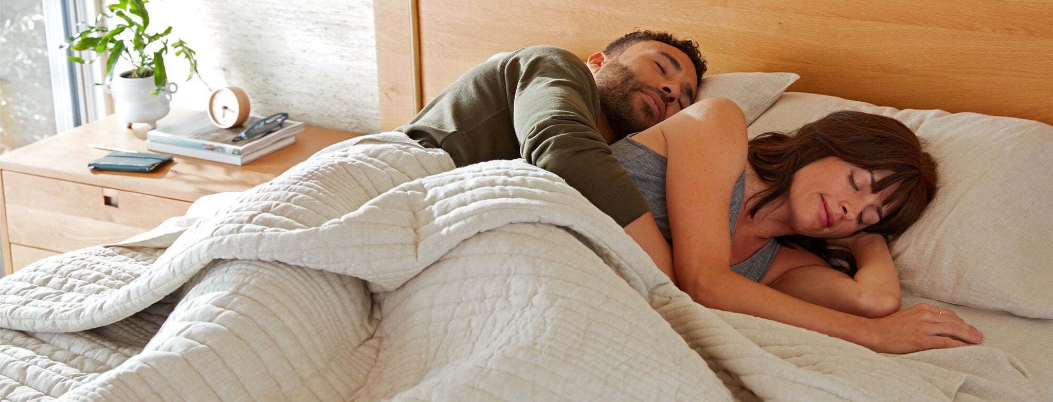 Couple Relaxing in Cozy Bedroom Setting
