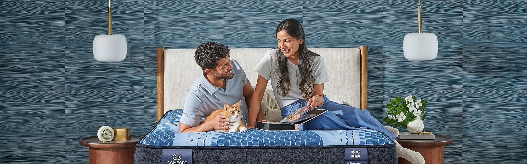 Couple relaxing on Serta mattress in bedroom