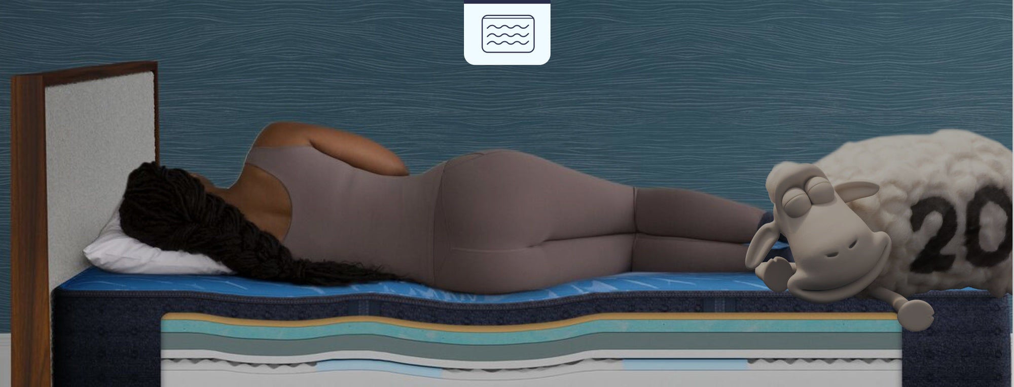 Woman resting on layered mattress with sheep
