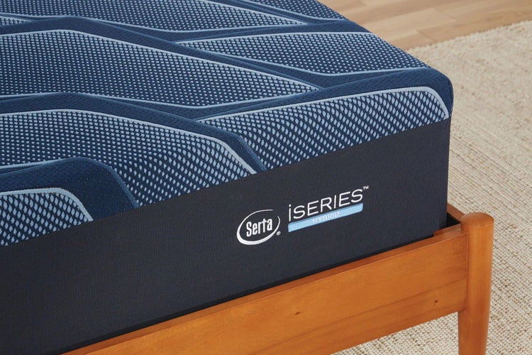 Serta iSeries mattress on wooden bed frame