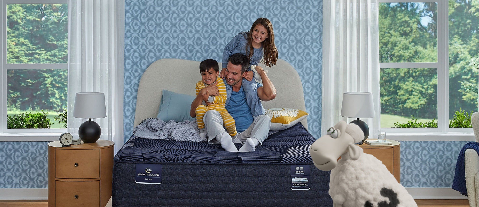 Family relaxing on a mattress indoors