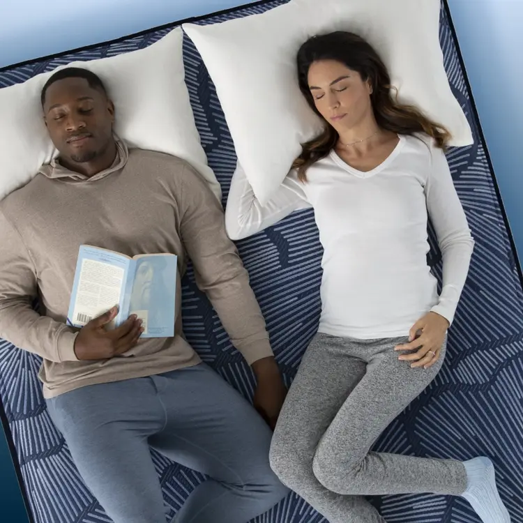 A couple sleeping on a perfect sleeper firm mattress||feel: firm||level: enhanced