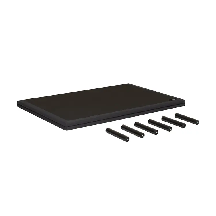 A black rectangular mat or pad shown on a plain white background, with five black cylindrical pieces placed in front of it.
